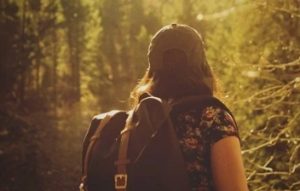 traveler carrying a backpack